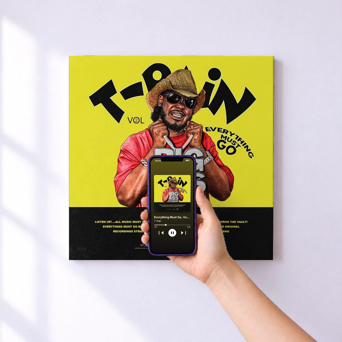 Affiche connectée Everything Must Go, Vol. 2 de T-Pain au mur : l'album se lance en approchant le téléphone