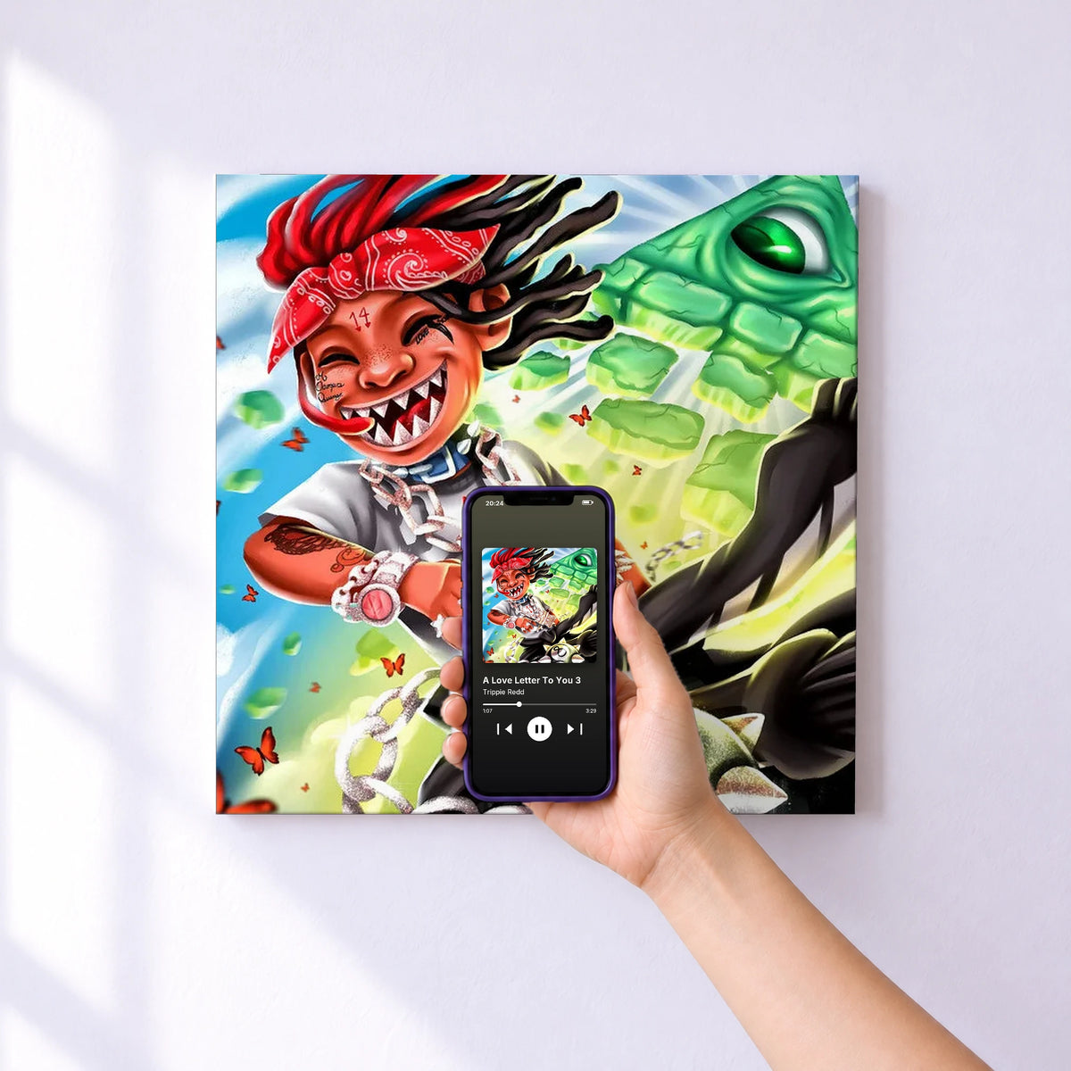 Affiche connectée A Love Letter To You 3 de Trippie Redd au mur : l'album se lance en approchant le téléphone