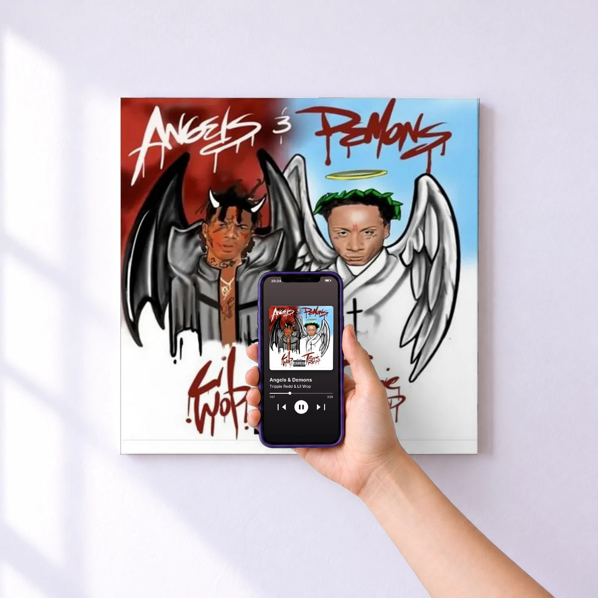 Affiche connectée Angels & Demons de Trippie Redd & Lil Wop au mur : l'album se lance en approchant le téléphone