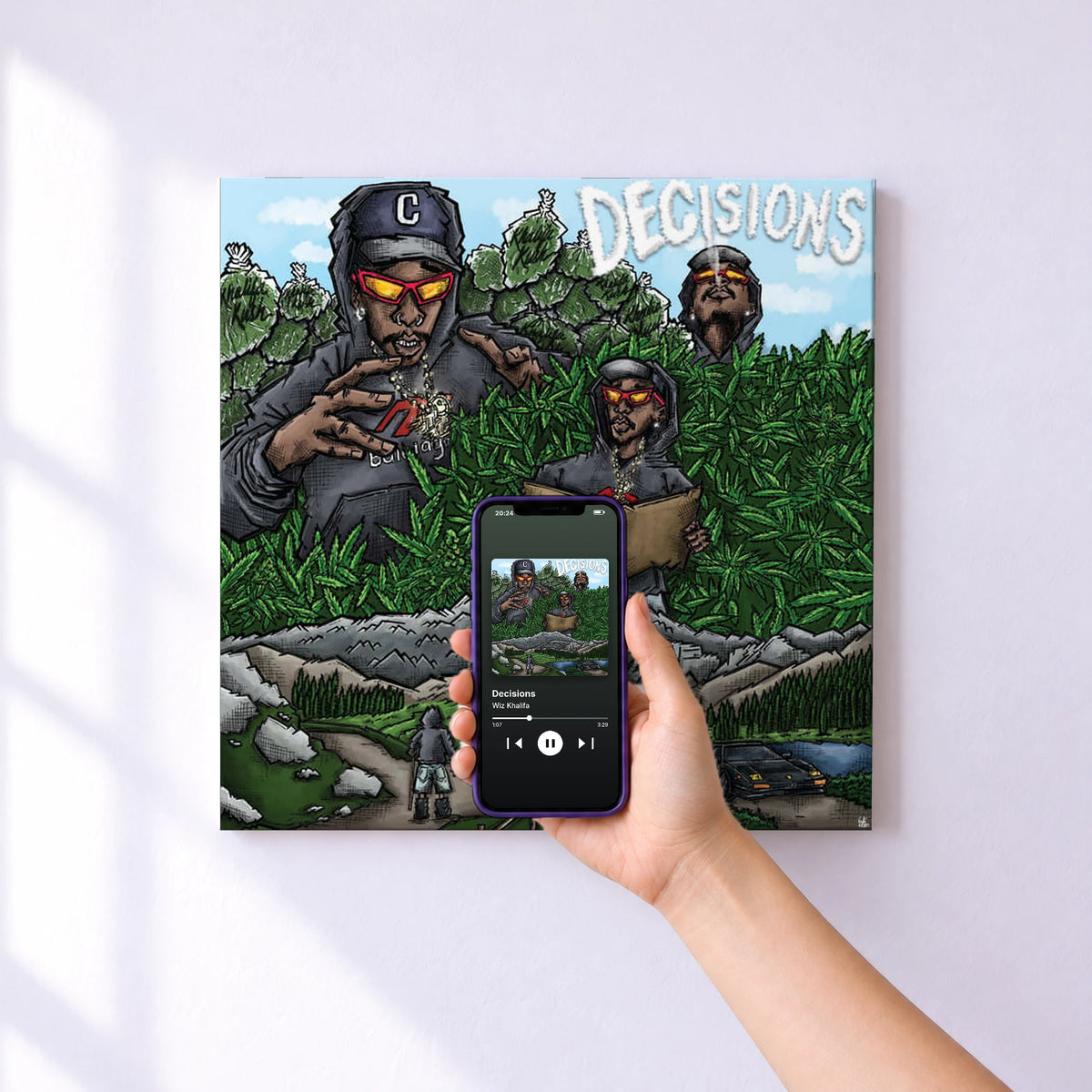 Affiche connectée Decisions de Wiz Khalifa au mur : l'album se lance en approchant le téléphone