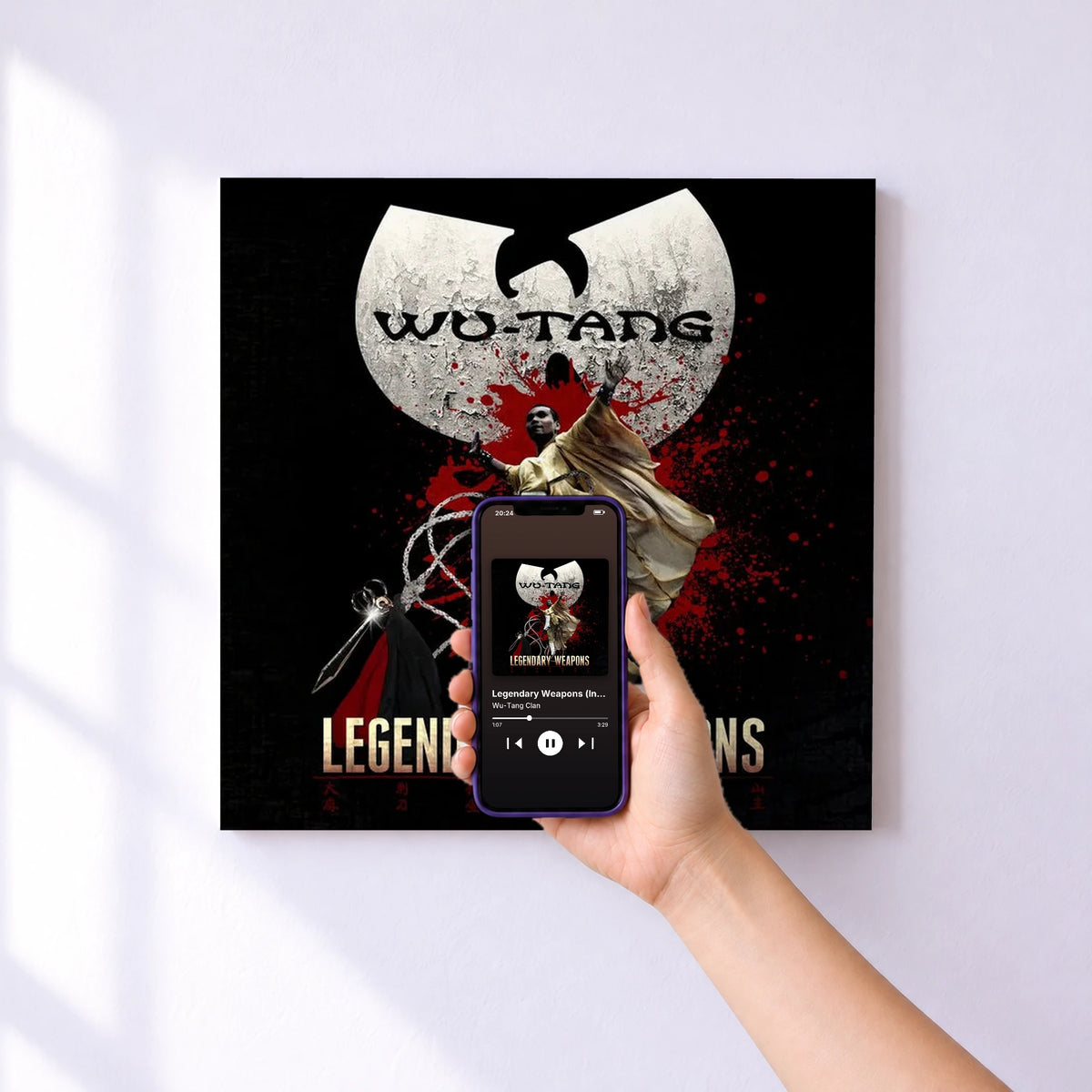 Affiche connectée Legendary Weapons (Instrumental Version) de Wu-Tang Clan au mur : l'album se lance en approchant le téléphone