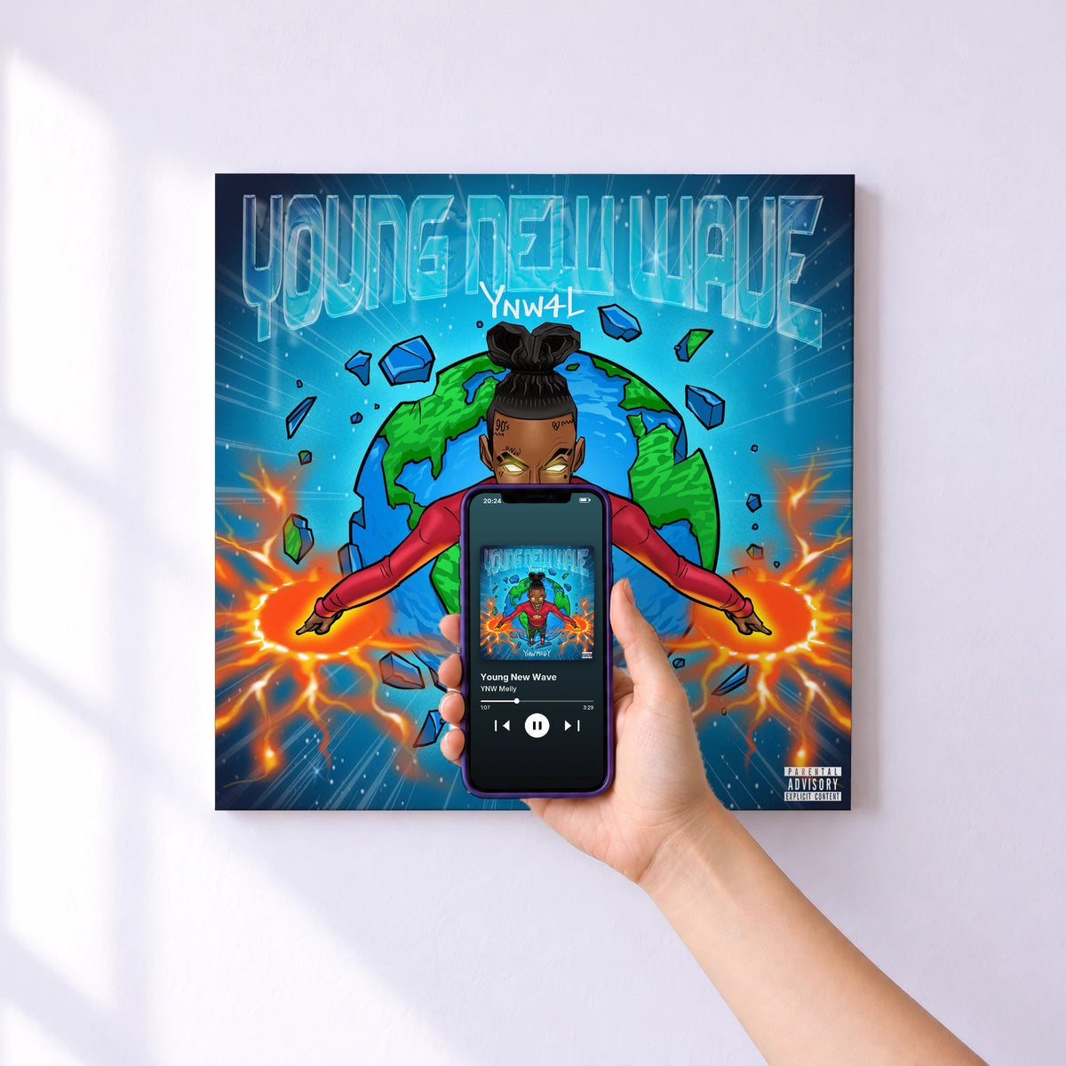 Affiche connectée Young New Wave de YNW Melly au mur : l'album se lance en approchant le téléphone