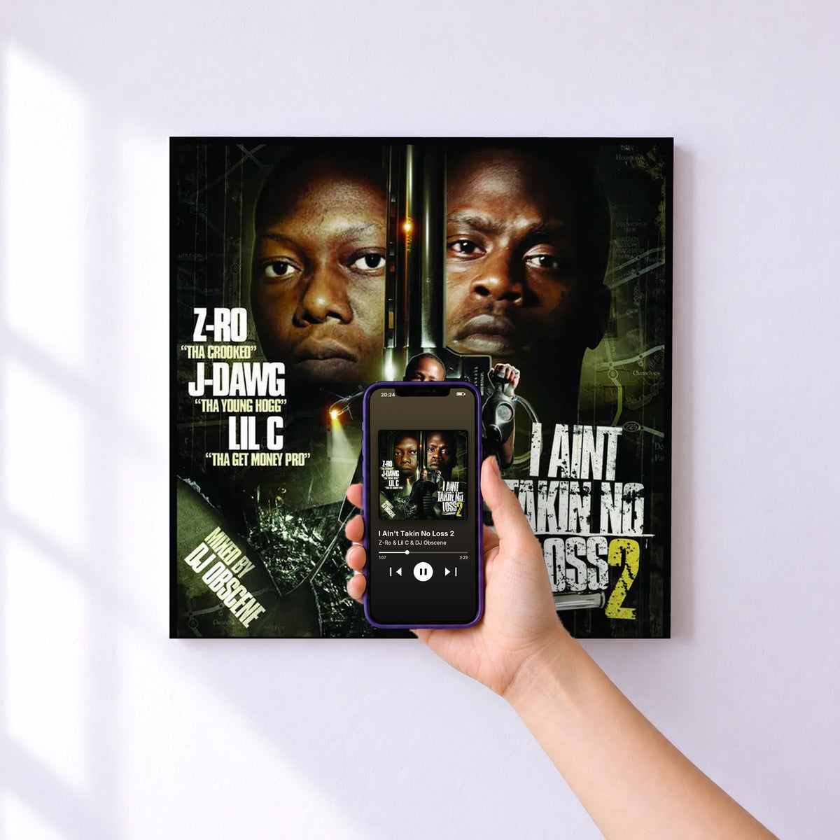 Affiche connectée I Ain't Takin No Loss 2 de Z-Ro & Lil C & DJ Obscene au mur : l'album se lance en approchant le téléphone